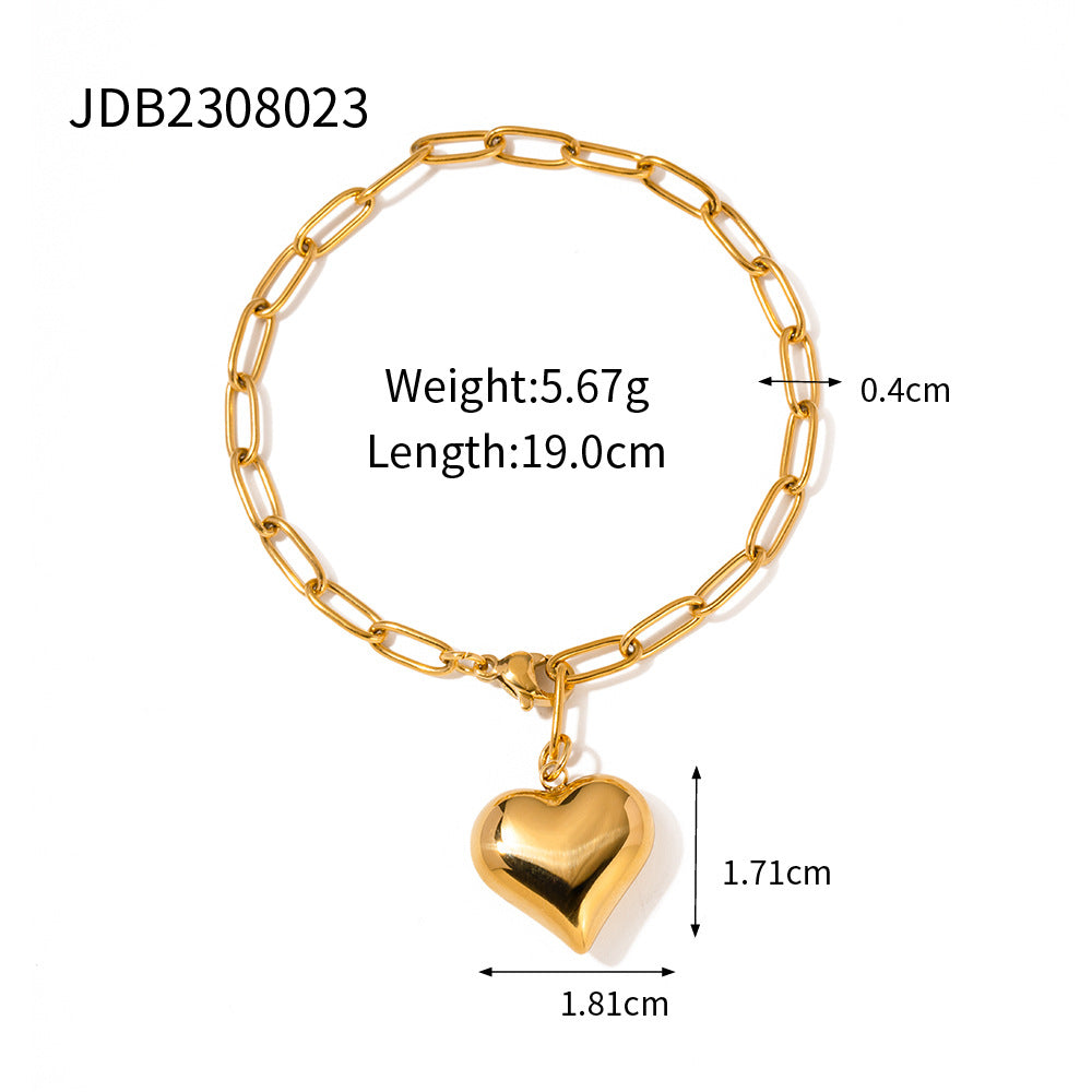Damen Armband mit eleganten Perlen und herzförmigem Anhänger Shop Nory
