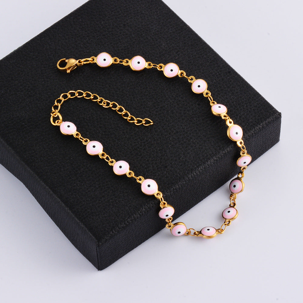 Damen Armband mit schützenden Augenmotiven und feinem Goldglanz Shop Nory