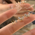 Damen Ohrstecker mit filigranem Schmetterlingsdesign und funkelnden Zirkonia Shop Nory