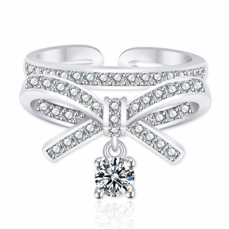 Damen Offener Ring mit kunstvollem Schleifen-Design und funkelndem Zirkonia Shop Nory