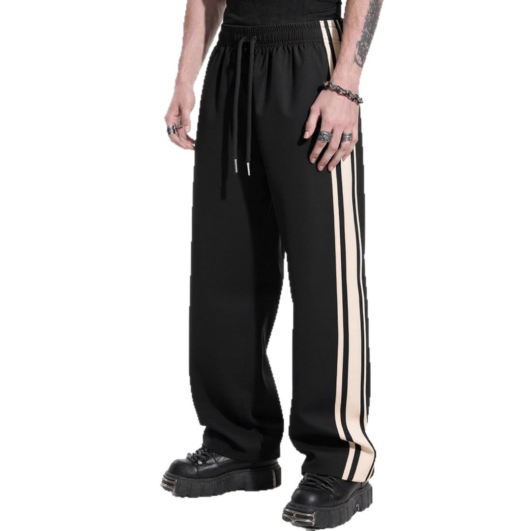 Herren Weite Trainingshose mit elastischem Tunnelzugbund, seitlichem Kontraststreifen & lockerem Baggy‑Schnitt Shop Nory
