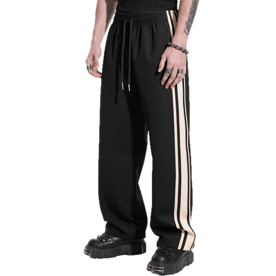 Herren Weite Trainingshose mit elastischem Tunnelzugbund, seitlichem Kontraststreifen & lockerem Baggy‑Schnitt Shop Nory