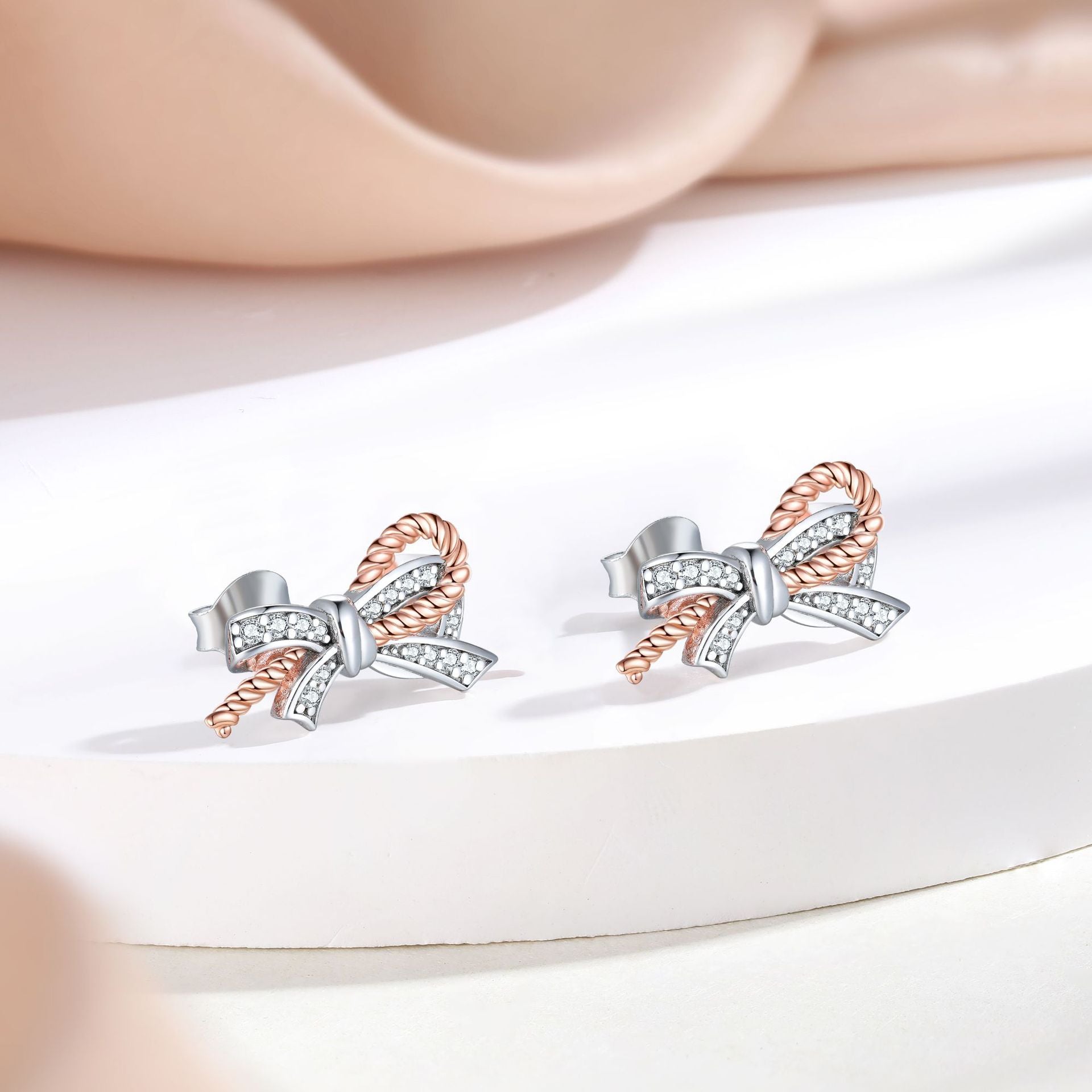 Damen Ohrringe im Schleifen-Design mit funkelndem Zirkonia-Besatz Shop Nory