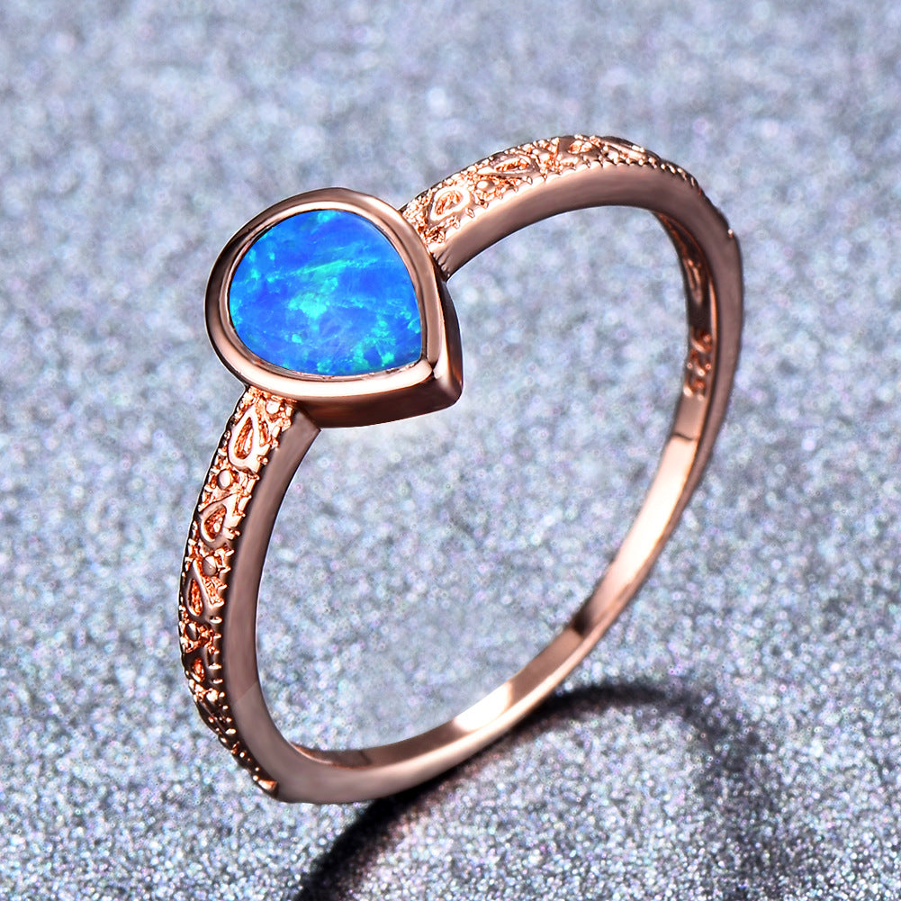 Damen Ring mit tropfenförmigem Opal und filigraner Zirkonia-Verzierung Shop Nory