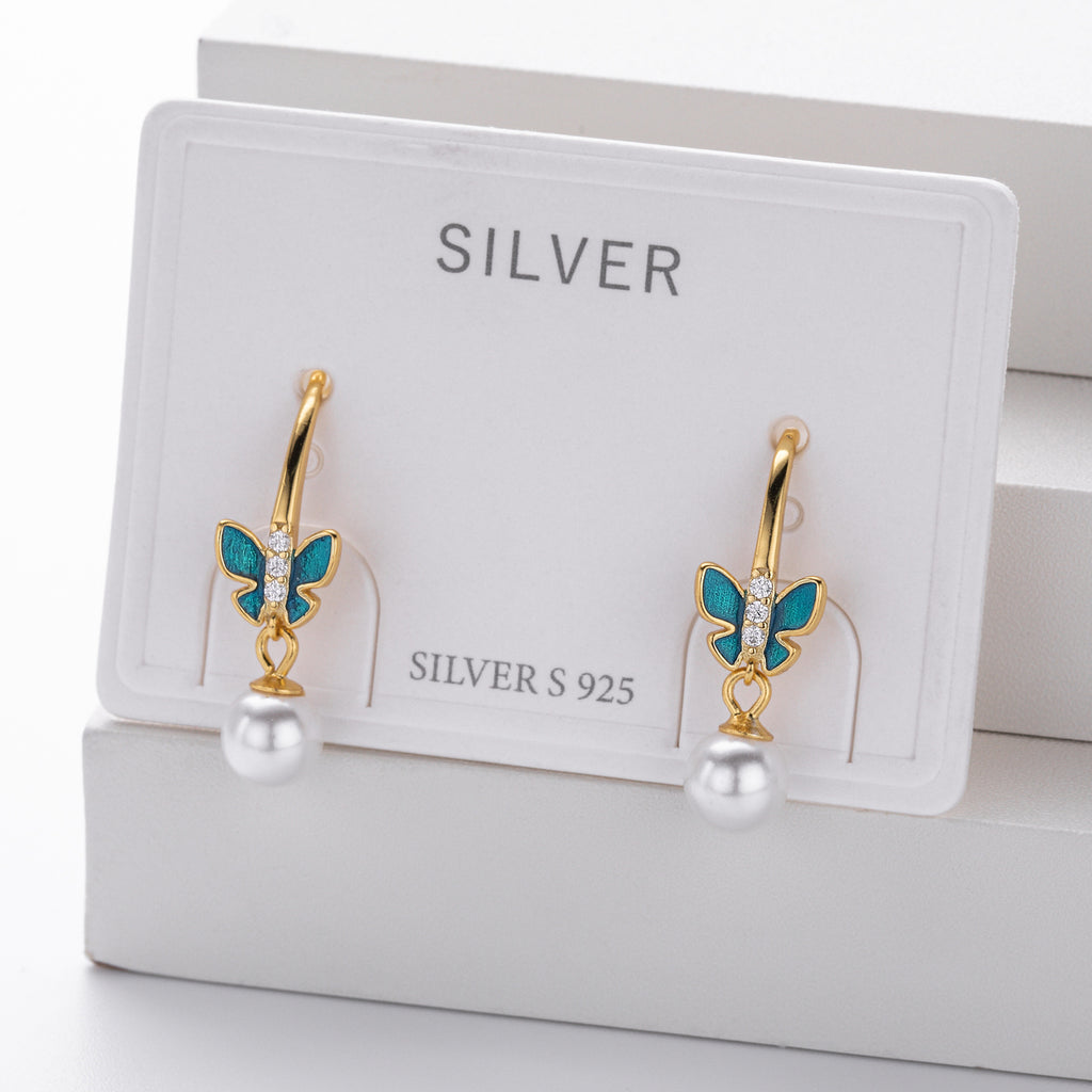 Damen Ohrhänger mit filigranem Schmetterlingsdesign aus hochwertigem 925 Sterling Silber und Perlenakzenten Shop Nory
