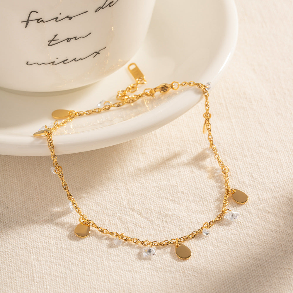 Damen Armband mit funkelnden Kristall- und Tropfenanhängern Shop Nory
