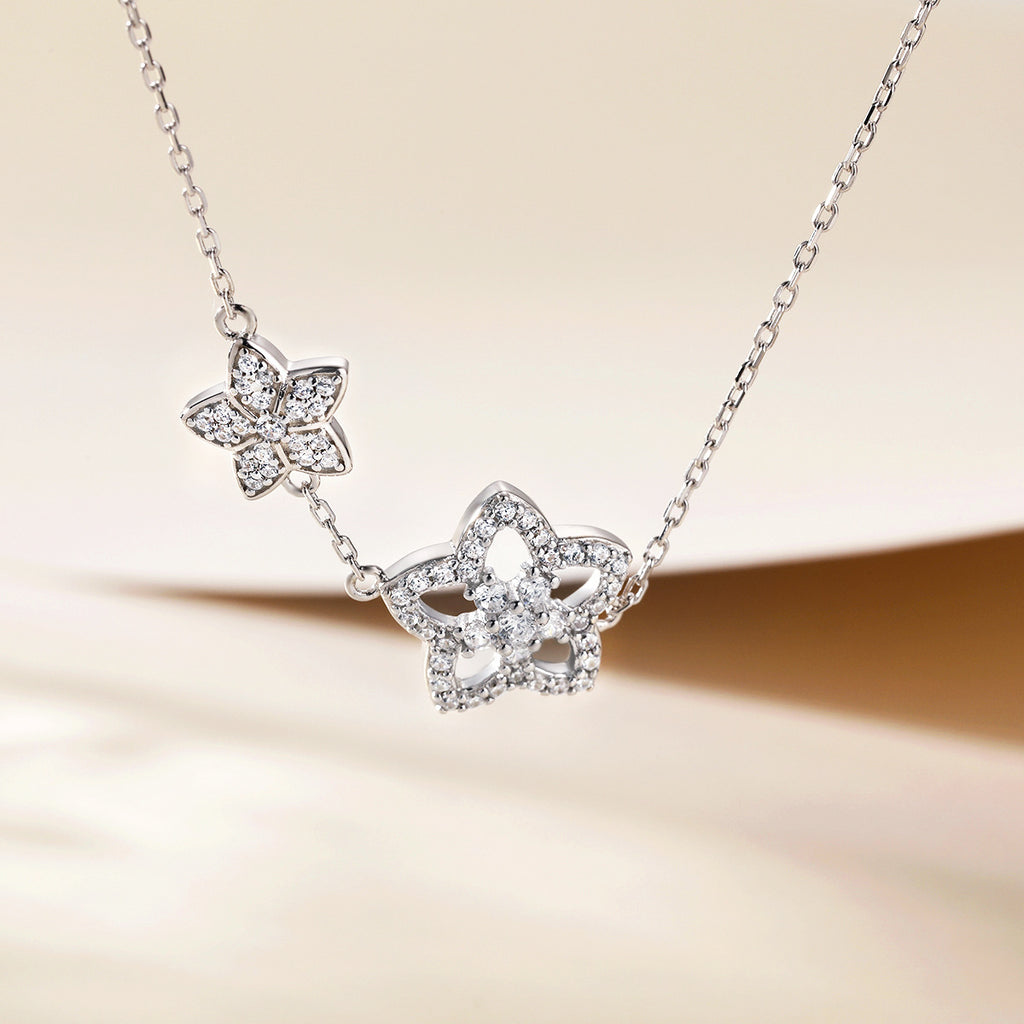 Damen Halskette mit floralen Anhängern und funkelnden Zirkonia Shop Nory
