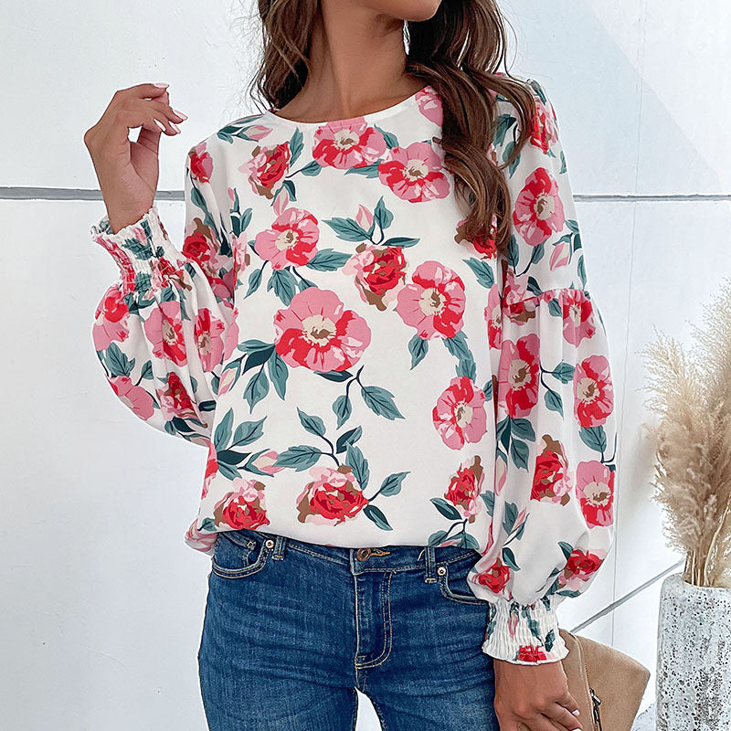 Damen Leichte Bluse mit großflächigem Blumenprint, Volumenärmeln und Smokbündchen Shop Nory