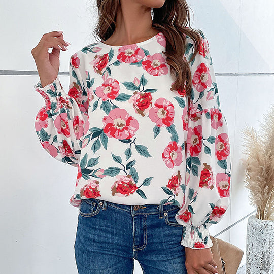 Damen Leichte Bluse mit großflächigem Blumenprint, Volumenärmeln und Smokbündchen Shop Nory