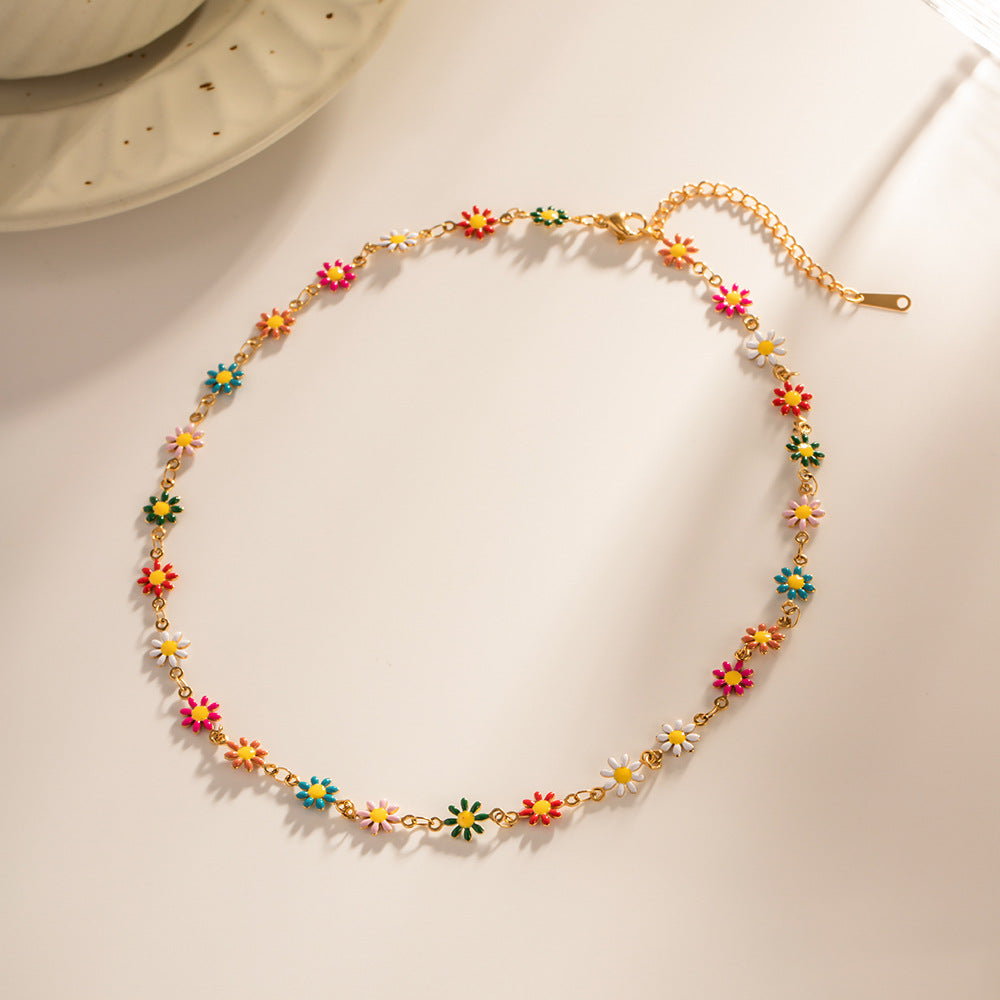 Damen Halskette mit bunten Blumenmotiven und goldfarbener Kettenverarbeitung Shop Nory