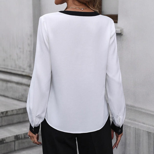 Damen Elegante V‑Ausschnitt-Bluse aus fließendem Stoff mit Kontrastpaspeln und Manschetten Shop Nory