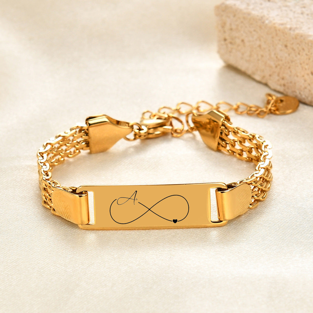 Damen Armband mit personalisierbarem Infinity-Anhänger und feinem Edelstahlband Shop Nory