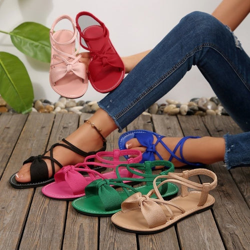Damen Zarte Römersandalen mit Schleifen-Detail und verstellbaren Schnürriemen Shop Nory