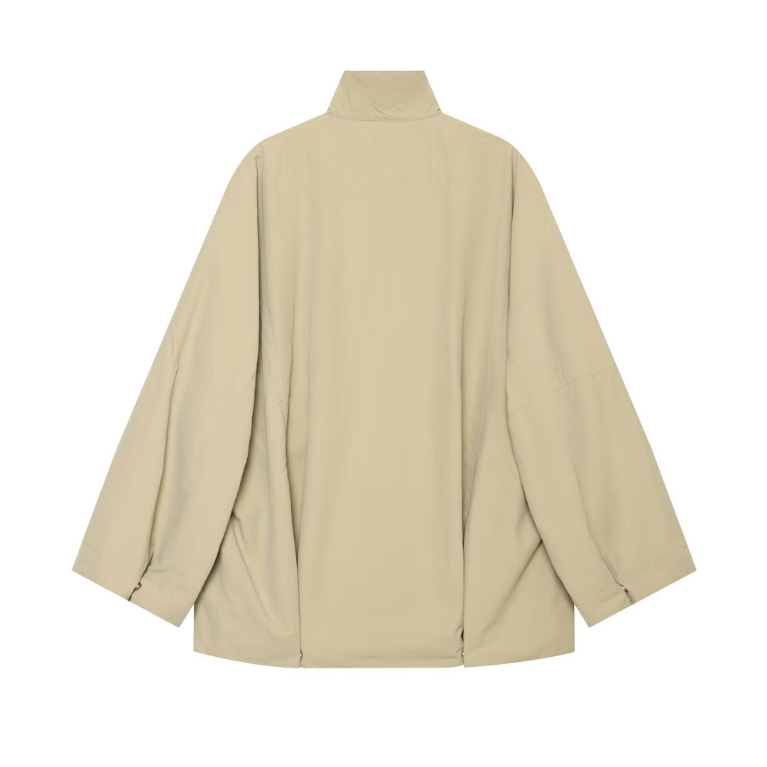 Damen Oversized Regenjacke im Cape‑Stil mit Stehkragen und Druckknopfblende Shop Nory