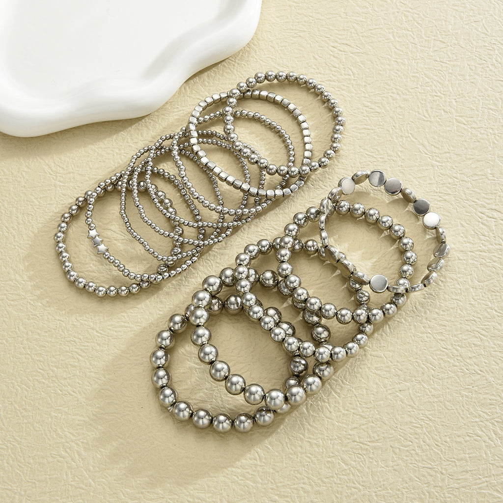 Damen Armreif-Set mit funkelnden metallischen Akzenten Shop Nory