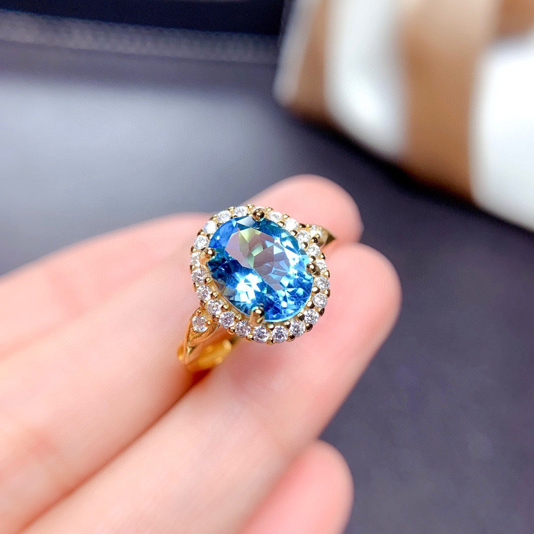 Damenring mit ovalem Rubin und zierlichem Zirkonia-Besatz Shop Nory