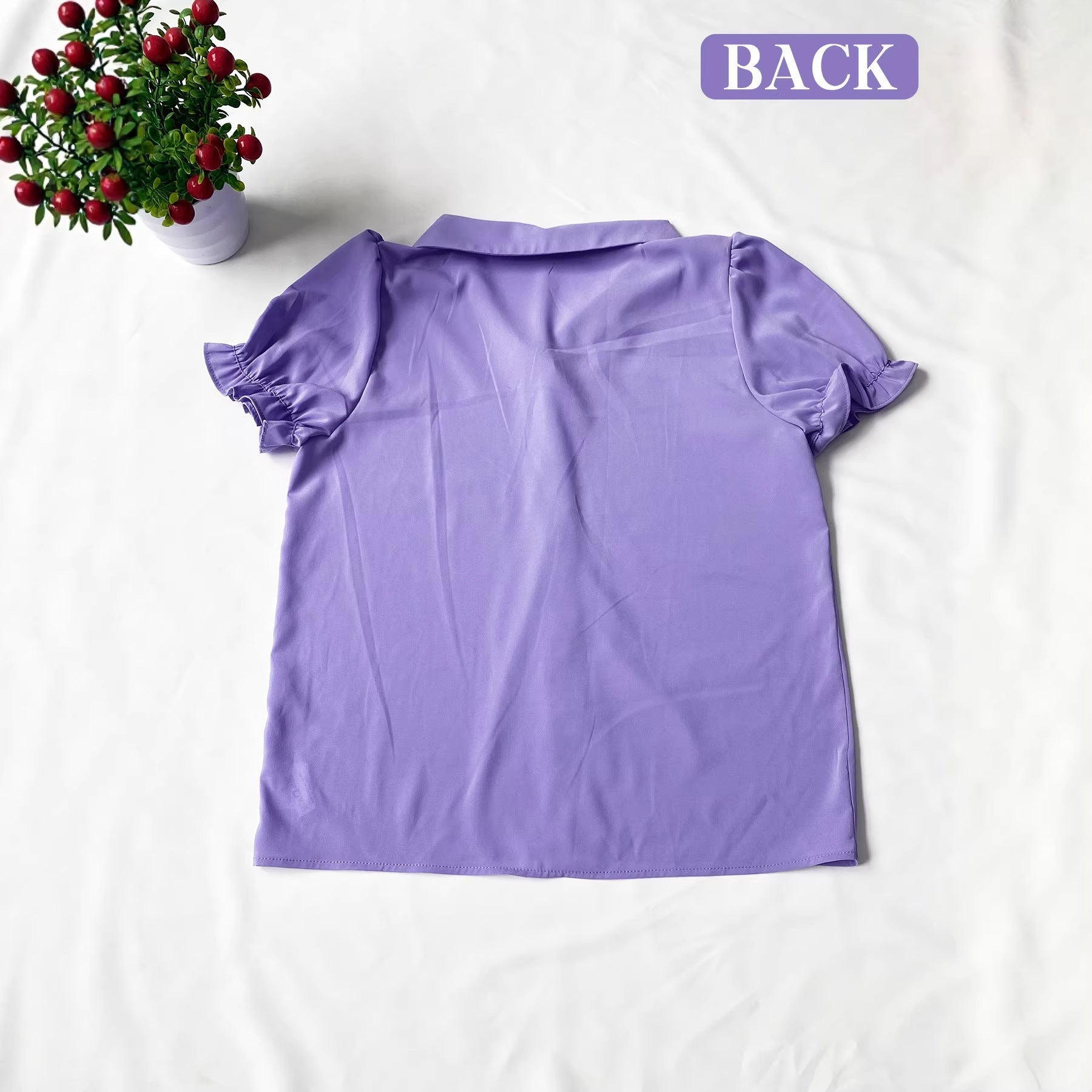 Damen Verspielt geschnittene Bluse mit Puffärmeln und Knopfdetails