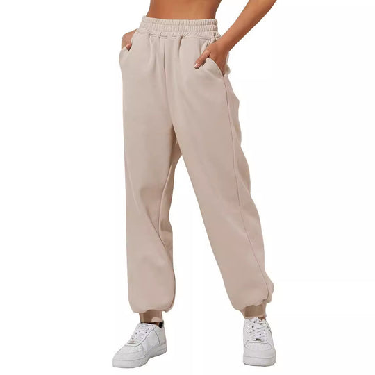 Damen nan lockere High‑Waist Jogginghose mit doppellagigem Komfortbund, seitlichen Eingrifftaschen und gerafften Knöchelbündchen Shop Nory