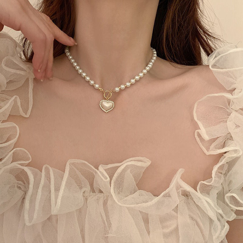 Damen Halskette mit klassischem Perlen-Design und Herzanhänger Shop Nory