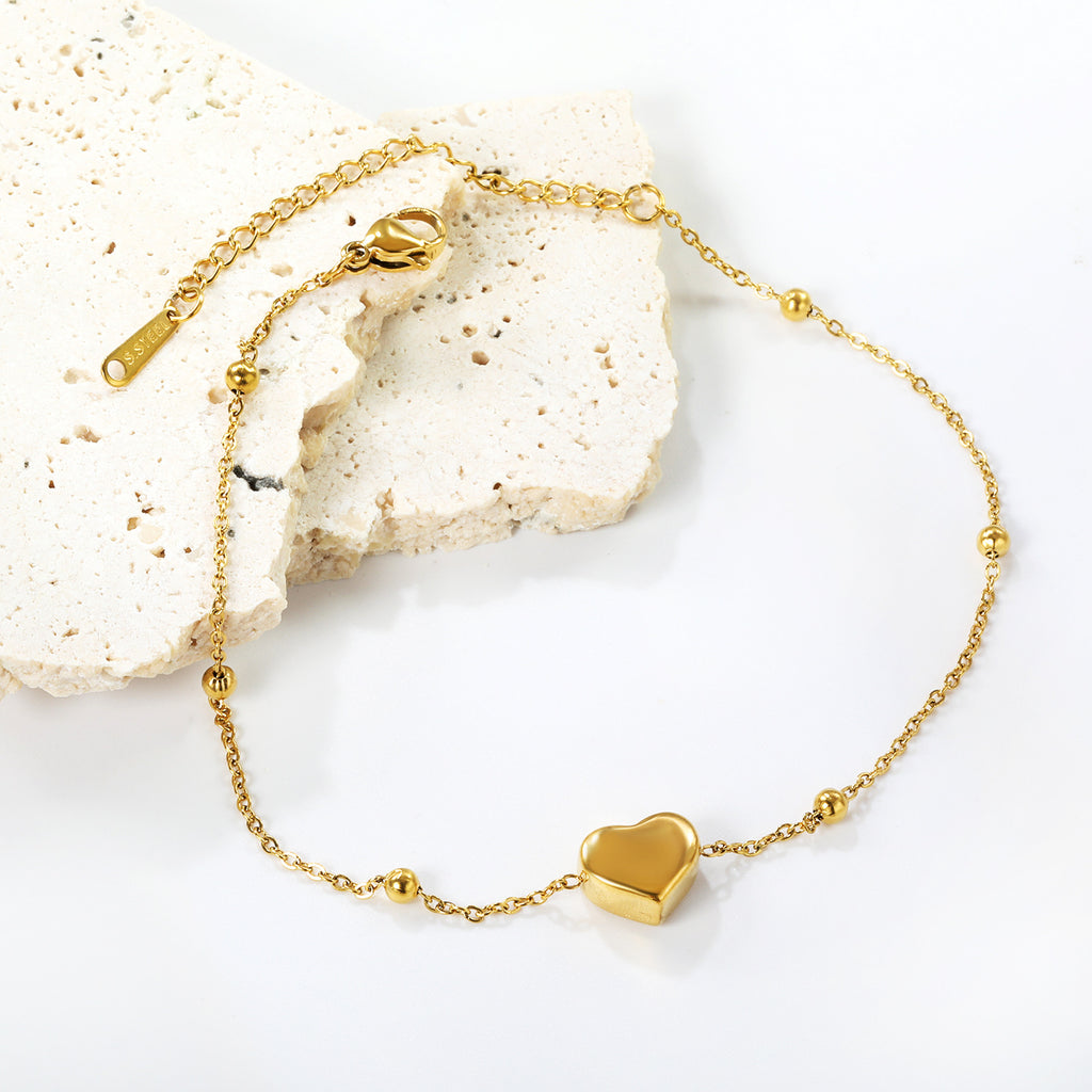 Damen Armband mit herzförmigem Anhänger und eleganten Kettendetails Shop Nory