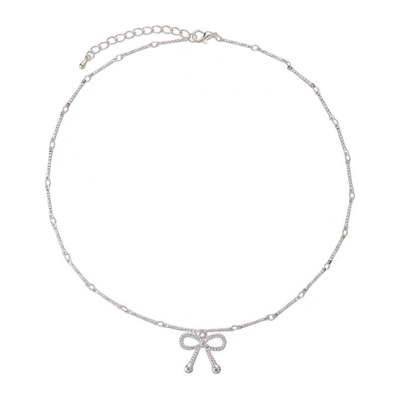 Damen Halskette mit kunstvollem Schleifenanhänger und filigraner Gliederung Shop Nory
