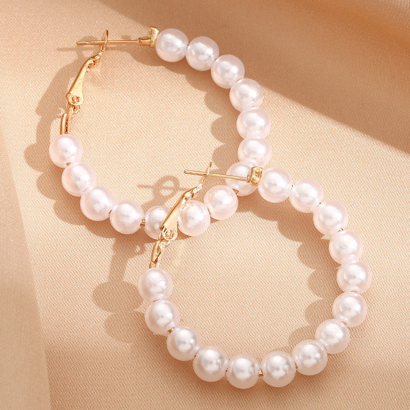 Damen Creolen mit luxuriösen Perlen und goldenen Akzenten Shop Nory