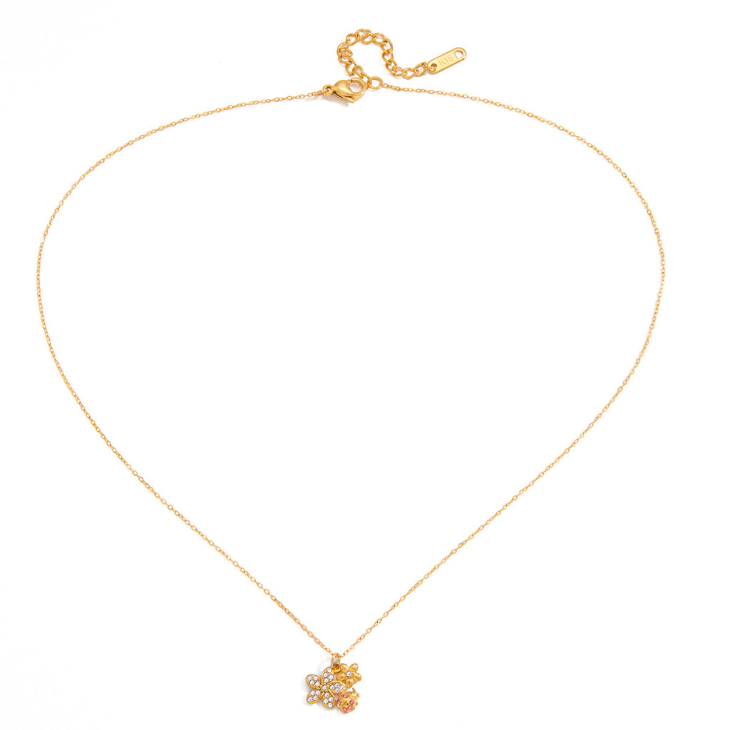 Damen Halskette mit floralem Anhänger und funkelnden Kristallen Shop Nory