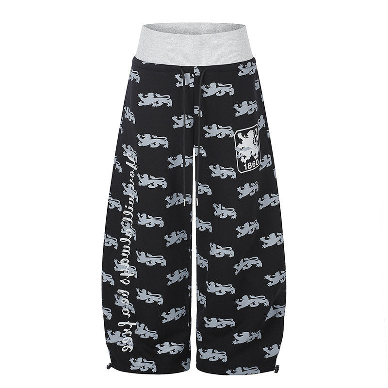 Damen Weite Culotte‑Palazzohose aus Sweat mit hohem Rippbund, Tunnelzug und heraldischem Wappenprint Shop Nory