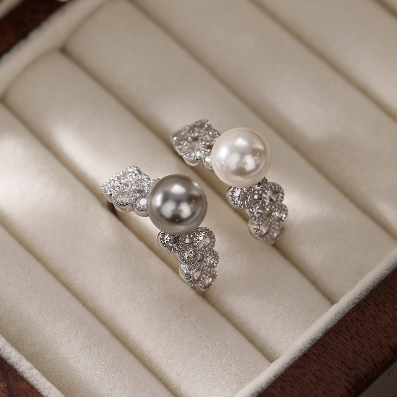 Damen eleganter Ring mit funkelnden Kristallen und Perle Shop Nory