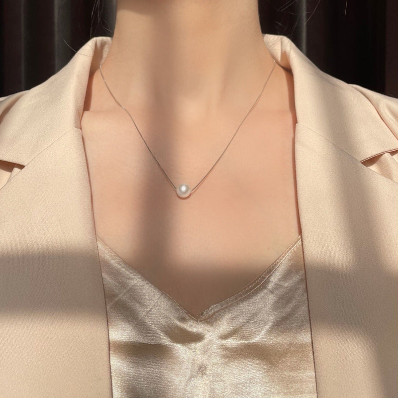 Damen Halskette mit luxuriösem Perlenanhänger und feiner Kettenstruktur Shop Nory