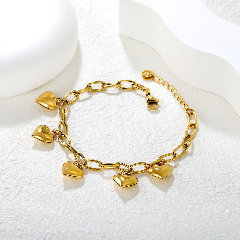 Damen Armband mit herzförmigen Anhängern und elegantem Gliederdesign Shop Nory