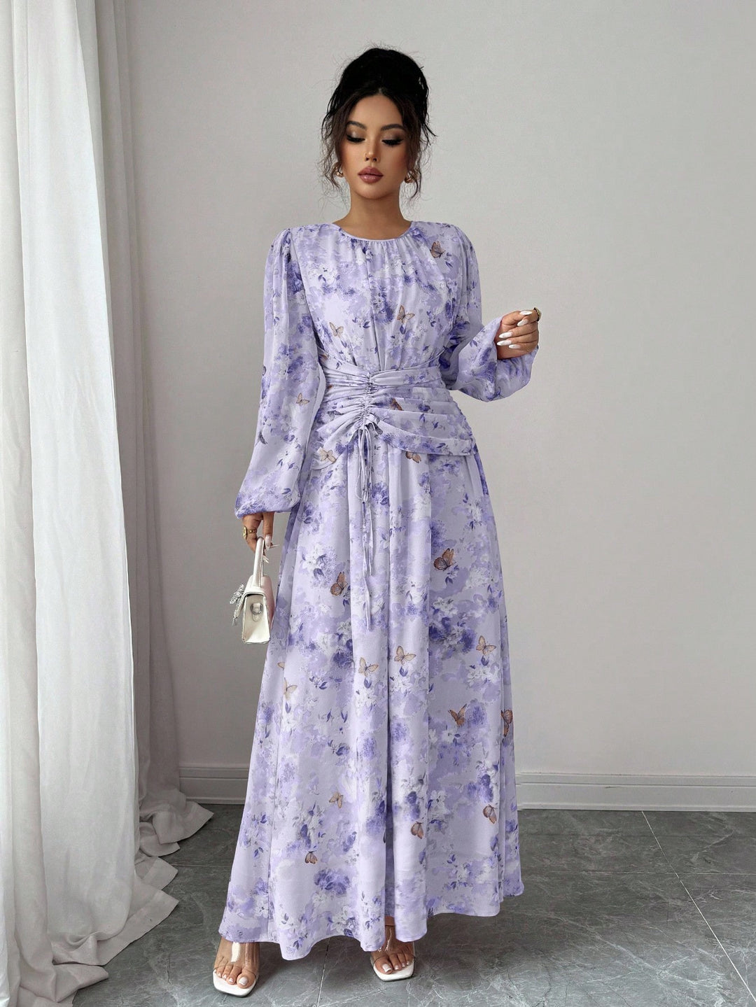 Damen Maxikleid mit floralem Schmetterlingsprint, geraffter Taillenpartie und langen Ballonärmeln Shop Nory