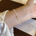 Damen zartes Perlenarmband mit funkelndem Zirkonia-Besatz Shop Nory