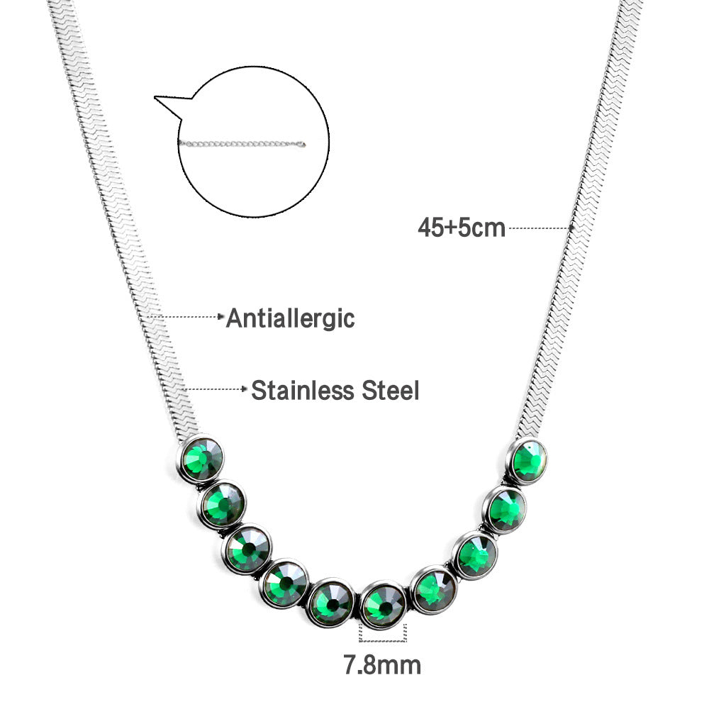 Damen Armband mit funkelnden grünen Kristallen und elegantem Gliederdesign Shop Nory