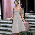 Damen Midikleid mit elegantem Bustier-Oberteil und fließendem Rock