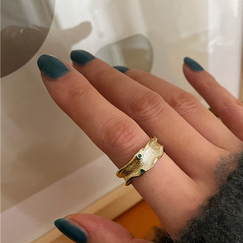 Damenring mit kunstvollem Design und funkelnden blauen Steinen Shop Nory