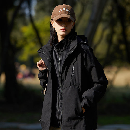 Damen zweilagige wasserabweisende Outdoorjacke mit Kapuze, Taillenregulierung und Kontrastbesätzen Shop Nory