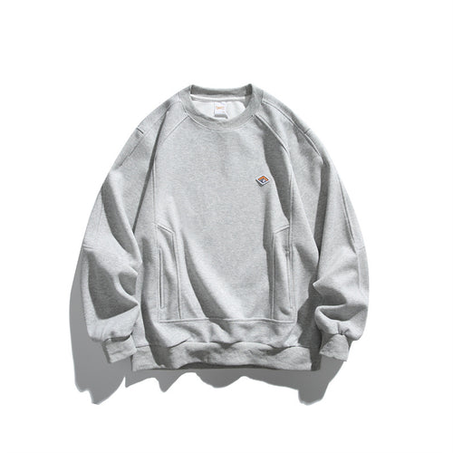 Unisex Oversize-Sweatshirt aus French-Terry mit Raglanärmeln, verdeckten Eingrifftaschen und kleinem Logopatch Shop Nory