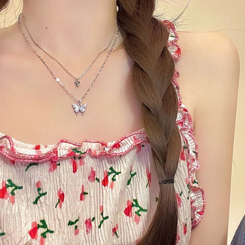 Damen Halskette mit filigranem Schmetterlings-Design und funkelnden Zirkonia Shop Nory