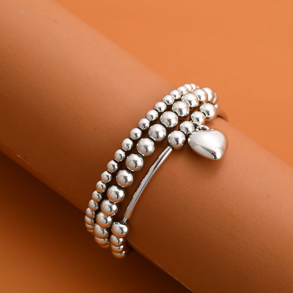 Damen Armband-Set mit funkelnden Perlen und eleganten Details Shop Nory
