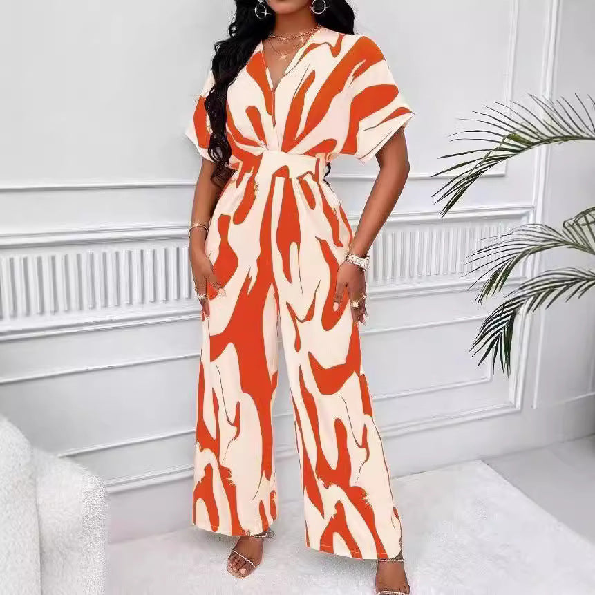 Damen Eleganter Jumpsuit mit großflächigem Muster und V-Ausschnitt