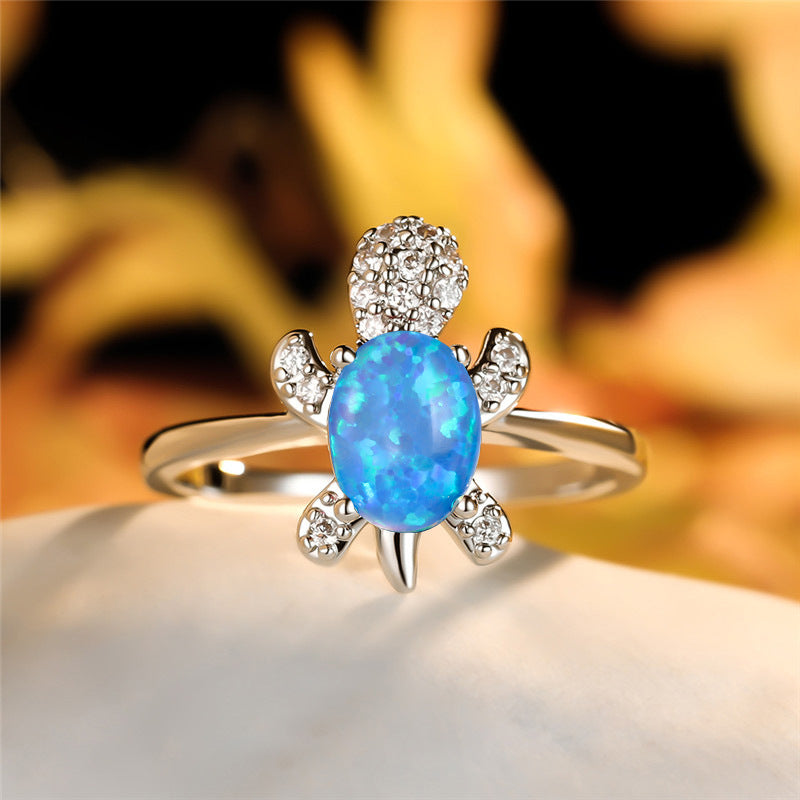 Damen Ring mit schimmerndem Schildkrötenmotiv und funkelnden Zirkoniasteinen Shop Nory
