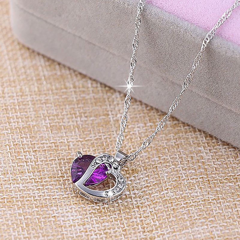 Damen Halskette mit herzförmigem Anhänger und funkelnden Kristallen Shop Nory