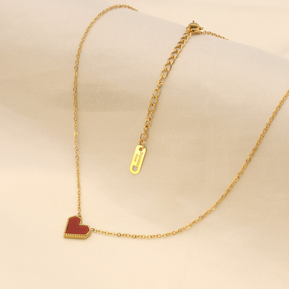 Damen Halskette mit herzförmigem Anhänger und feiner Goldverzierung Shop Nory