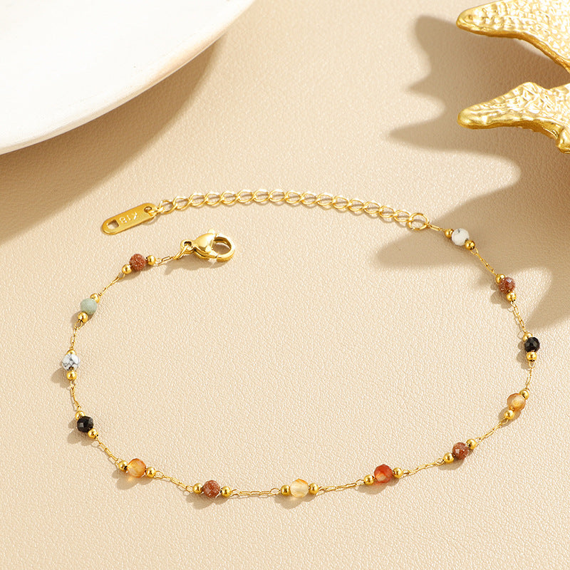 Damen elegantes Armband mit bunten Edelstein-Details und feiner Kettenstruktur Shop Nory