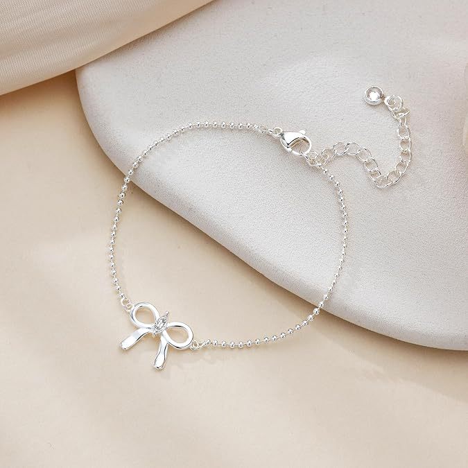 Damen Armband mit elegantem Schleifen-Design und funkelndem Zirkonia-Shop Nory