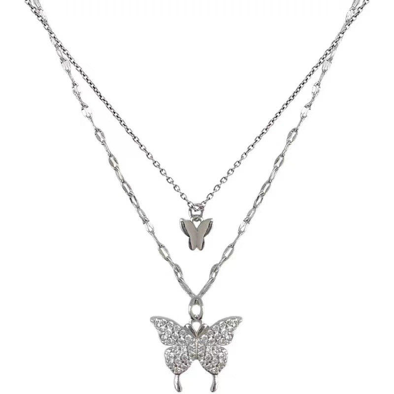 Damen Halskette mit filigranem Schmetterlings-Design und funkelnden Zirkonia Shop Nory