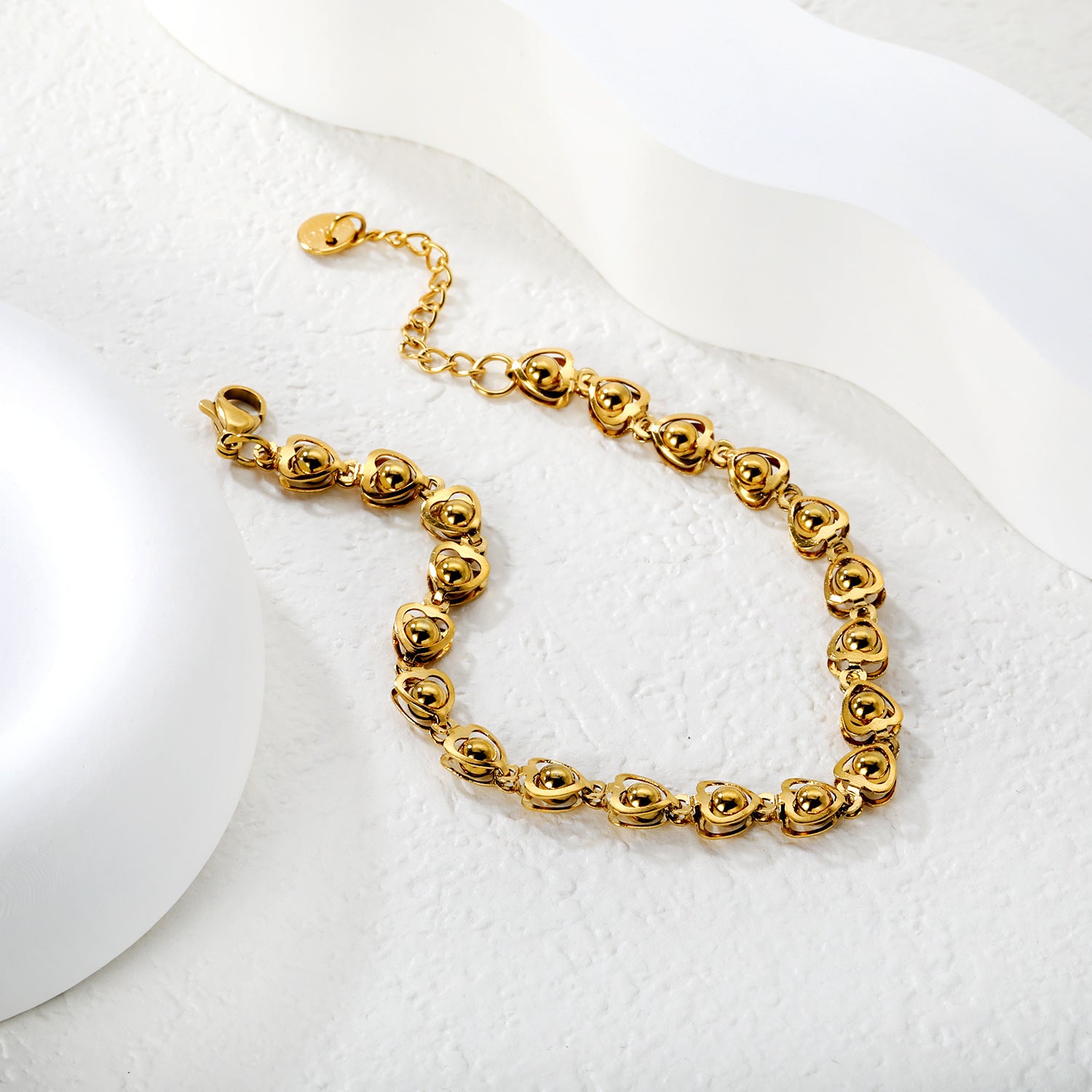 Damen Armband mit herzförmigen Anhängern und verstellbarem Verschluss Shop Nory