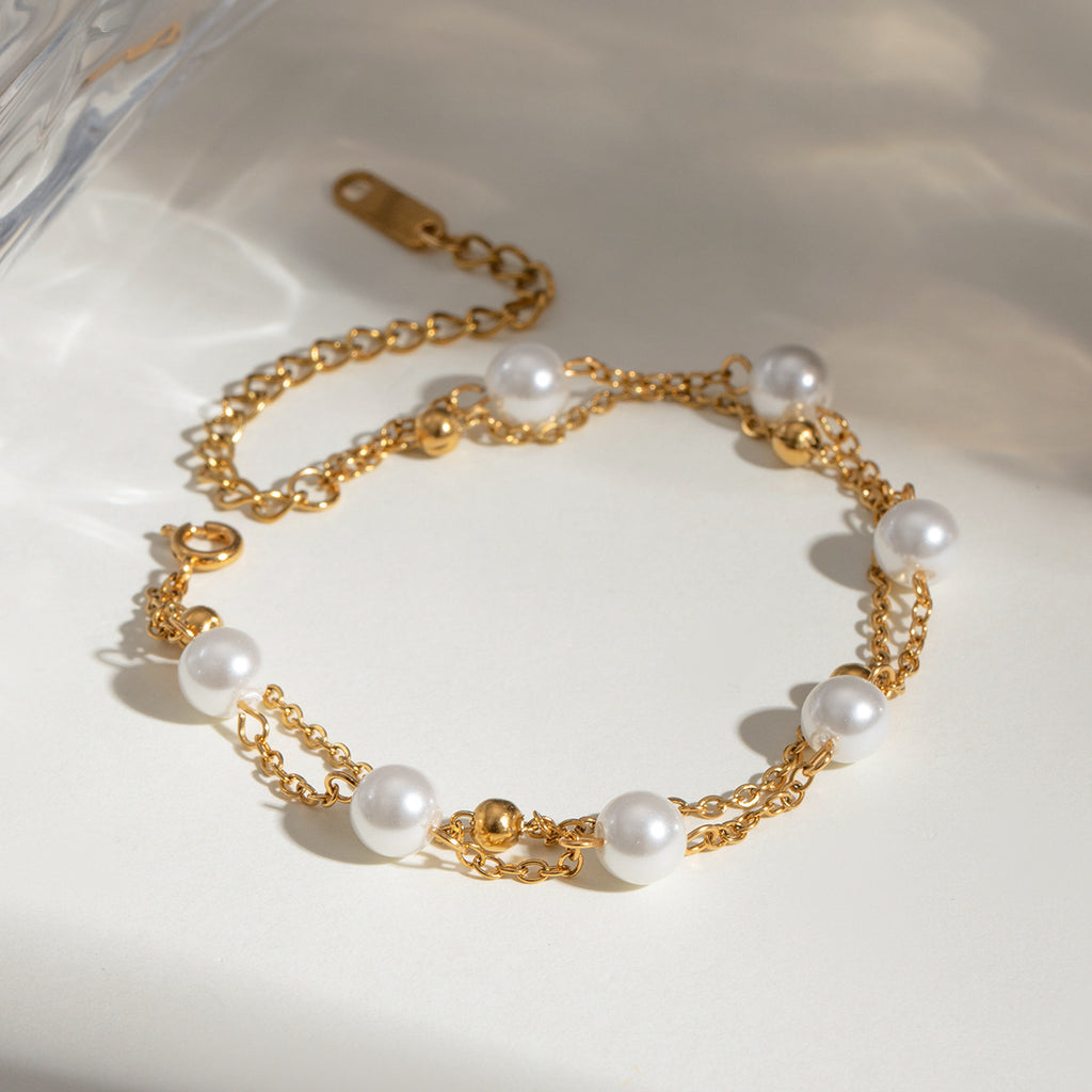 Damen Armband mit elegantem Perlen- und Goldakzent Design Shop Nory