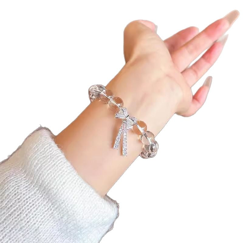 Damenarmband mit funkelndem Kristall-Detail und elegantem Schleifen-Design Shop Nory